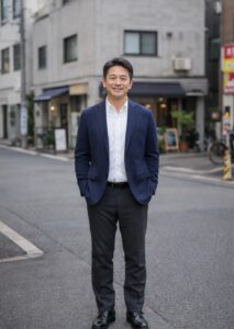 ２代目経営者、社長の街中、自社の前で撮影した写真。